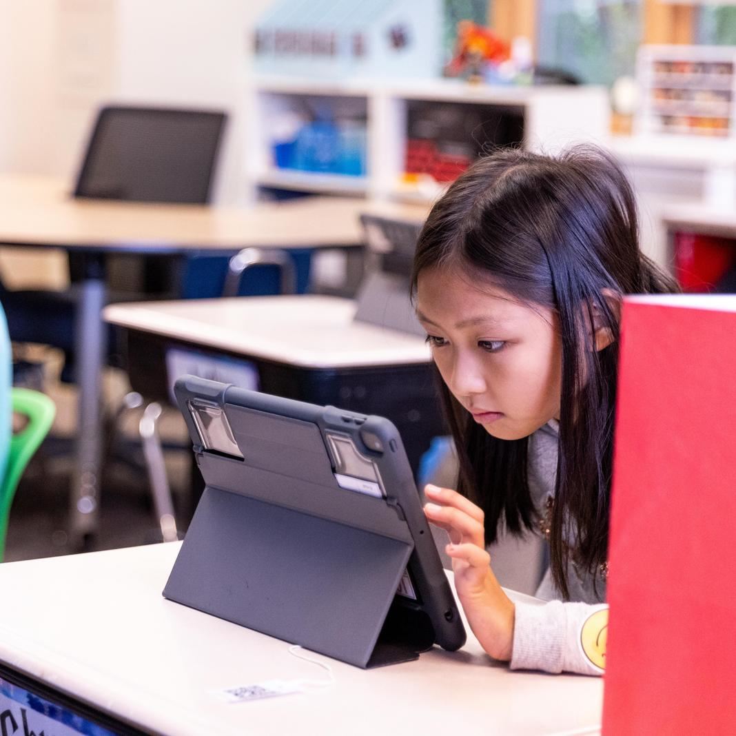  A student works on an iPad